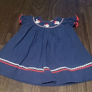 Adorable Navy and Red Kids Dress with embroidered Santa Smocked design